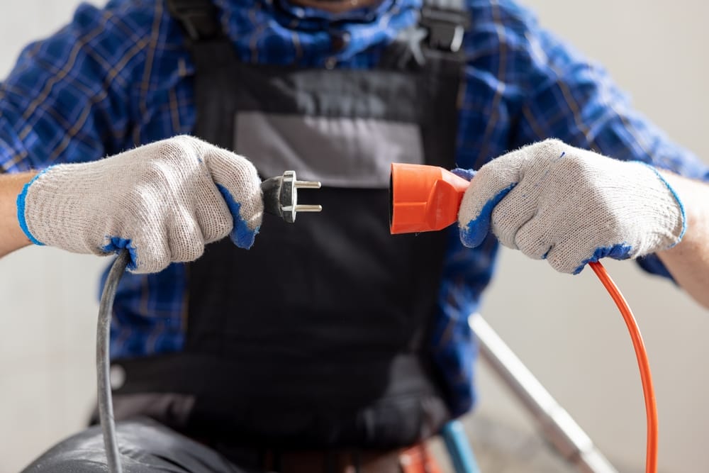 connecting the cords to power up your shed